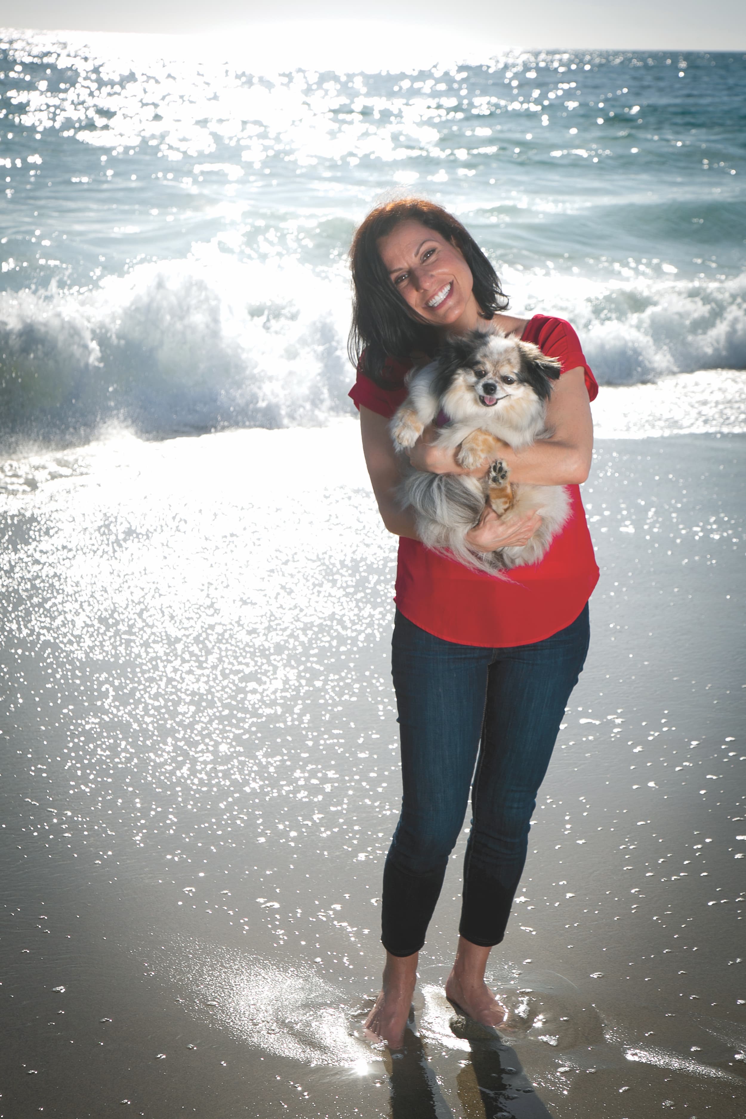 Jennifer Halbert, founder of We Love Laguna Beach, with her Pomeranian mix Bitsy